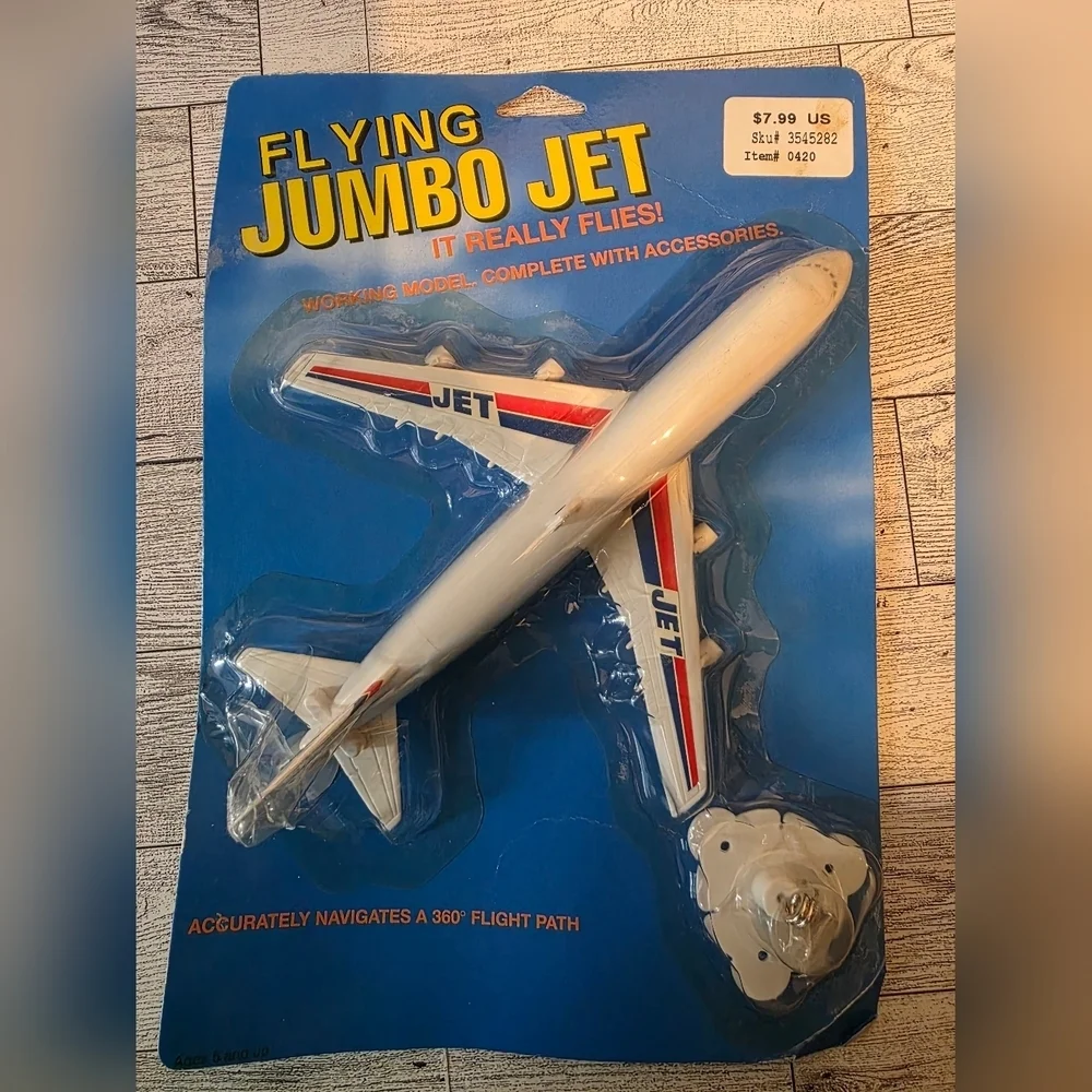 Vintage Flying Jumbo Jet Toy - White with Red and Blue Accents